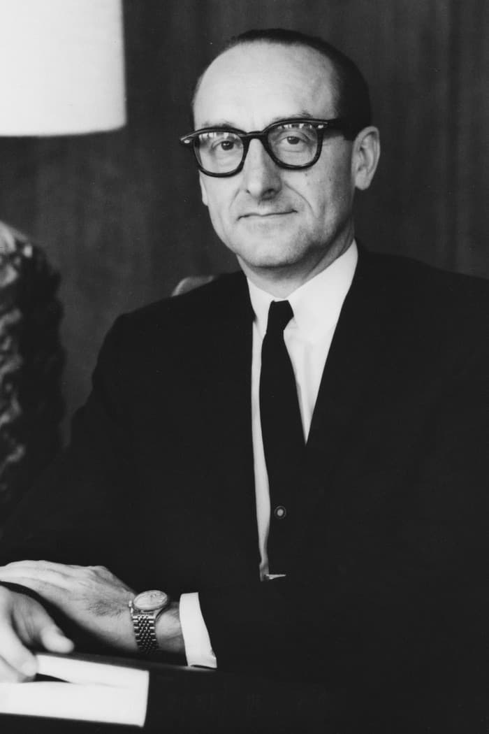 George E. Mueller profile