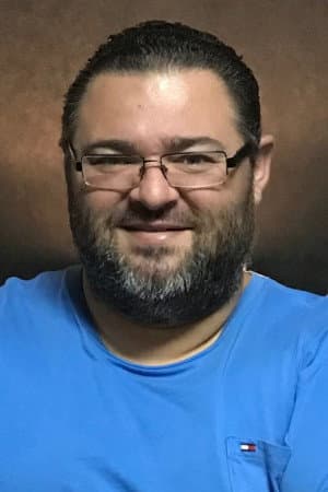 Carlos E. Aguilar profile