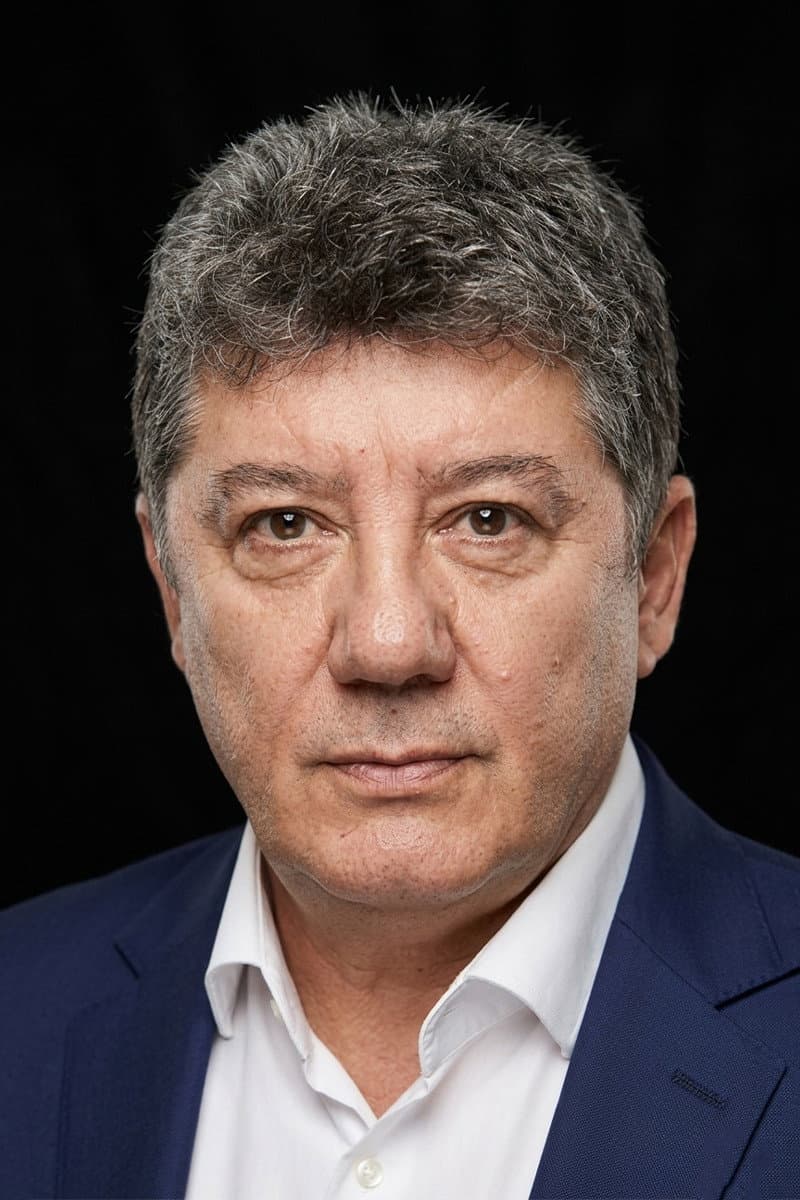 Tarık Ünlüoğlu profile