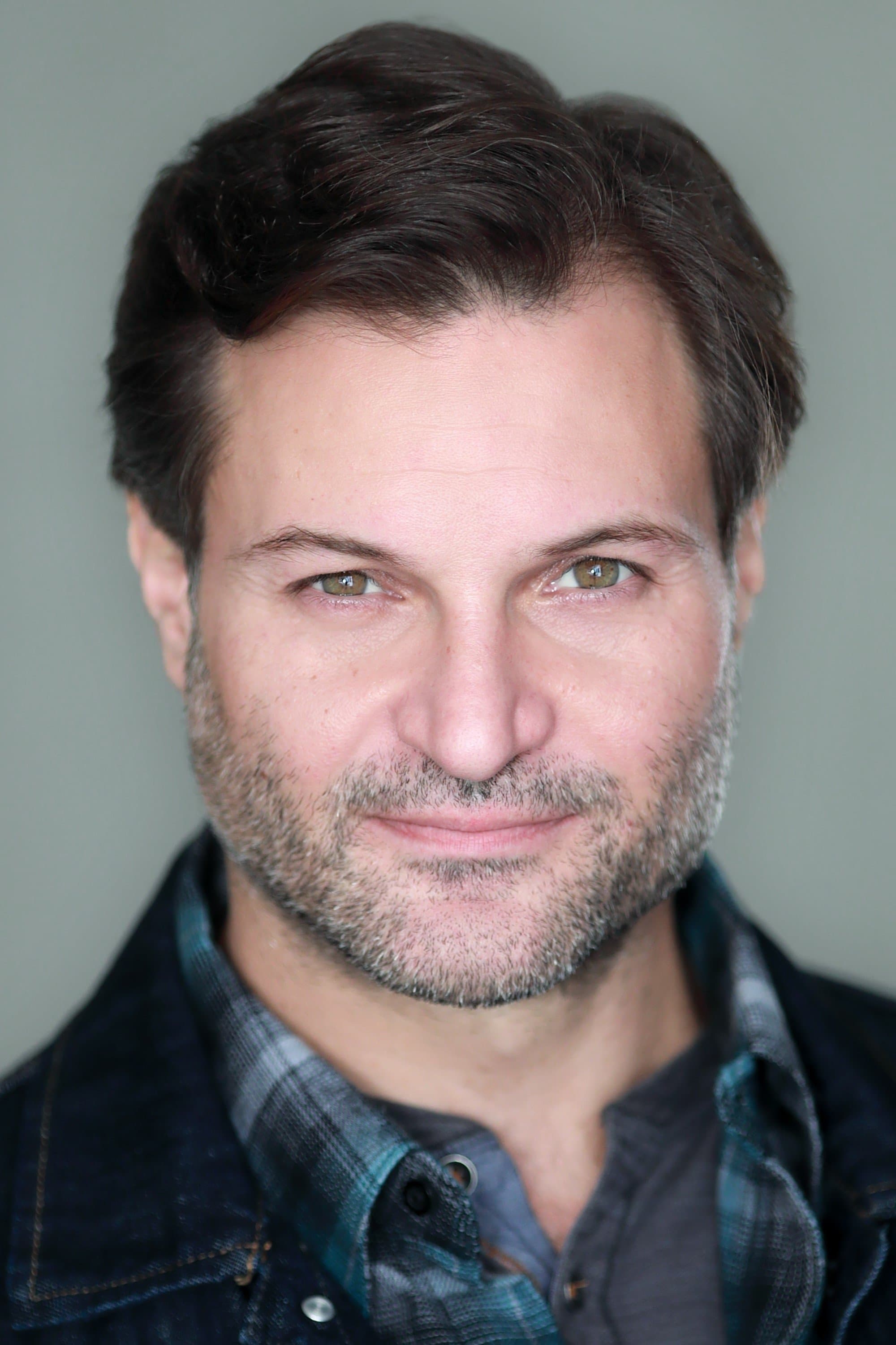 Justin Adams profile