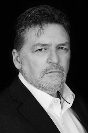 Tim J. Henley profile