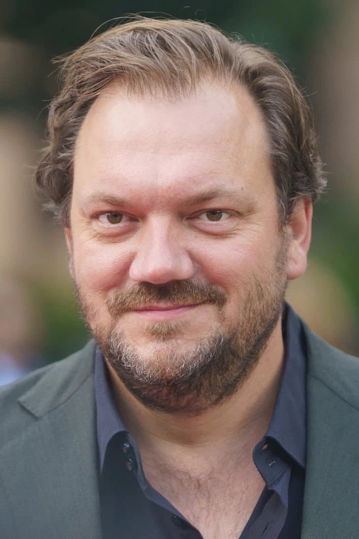 Charly Hübner profile