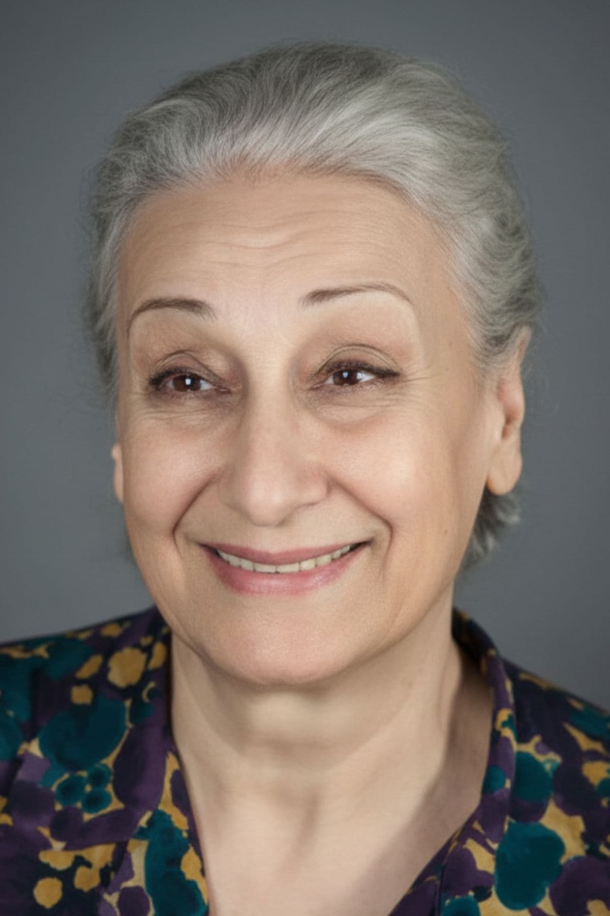 Mualla Sürer profile