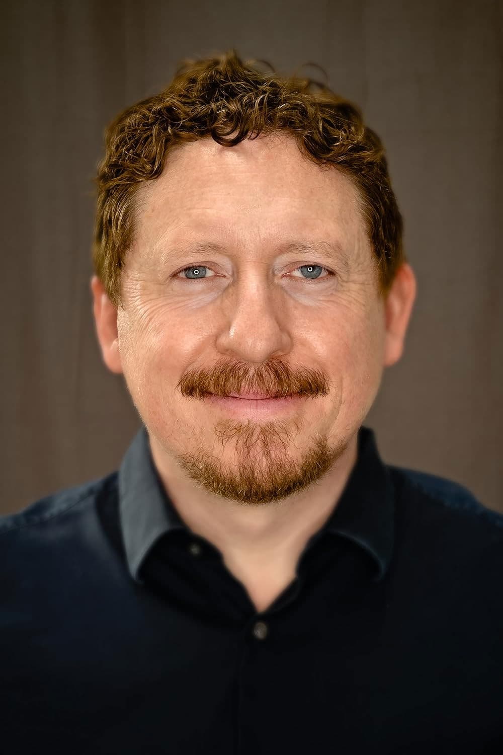 Caradog W. James profile