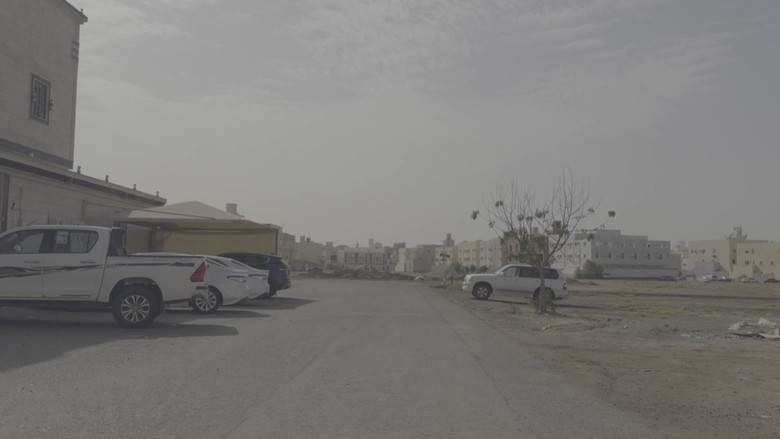 To Live and Die in AlHamadaniyyah backdrop